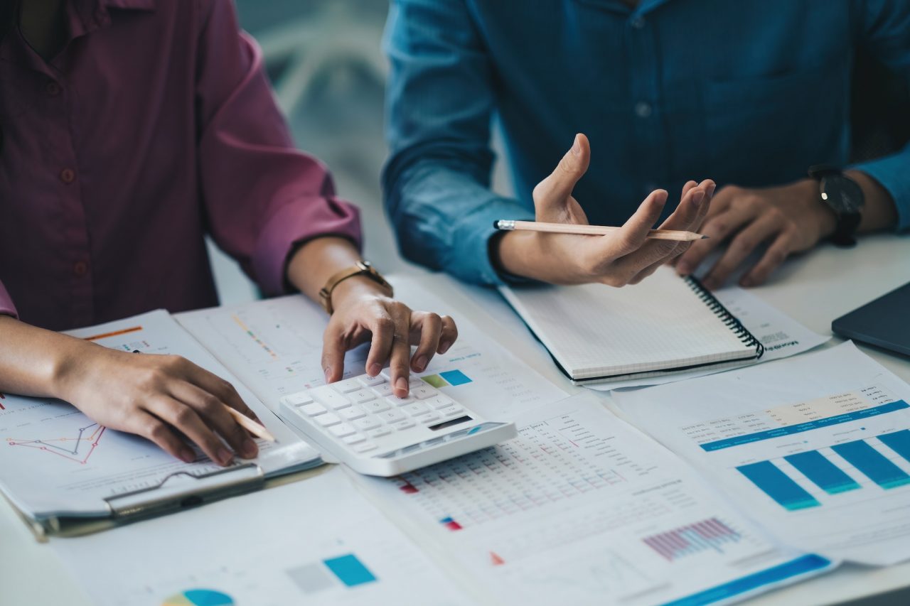 meeting business team advisor about charts financial graphs showing results are analyzing and